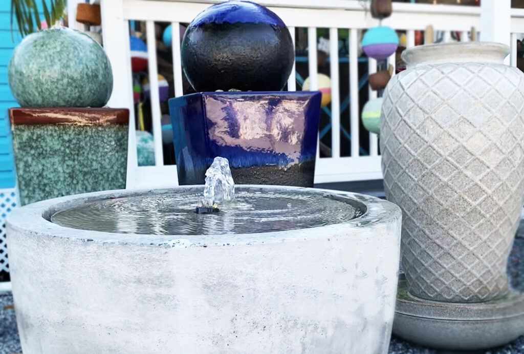 A fountain with several different shapes and sizes of water.